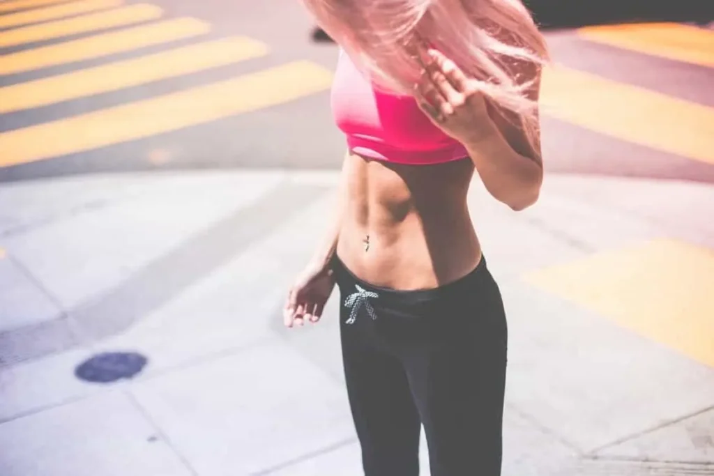 Woman with toned stomach after LA-EMS Body Sculpting Treatment Uxbridge Moor
